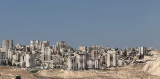 توسع استيطاني متسارع شرق القدس المحتلة يهدد بعزل المدينة وتقسيم الضفة الغربية